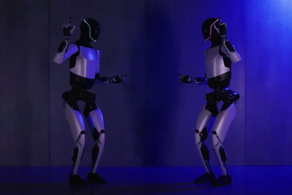 Tesla Optimus Gen 2 Humanoid Robot Unveiled Dances Boils Egg Squats and More Company Shared Video Watch
